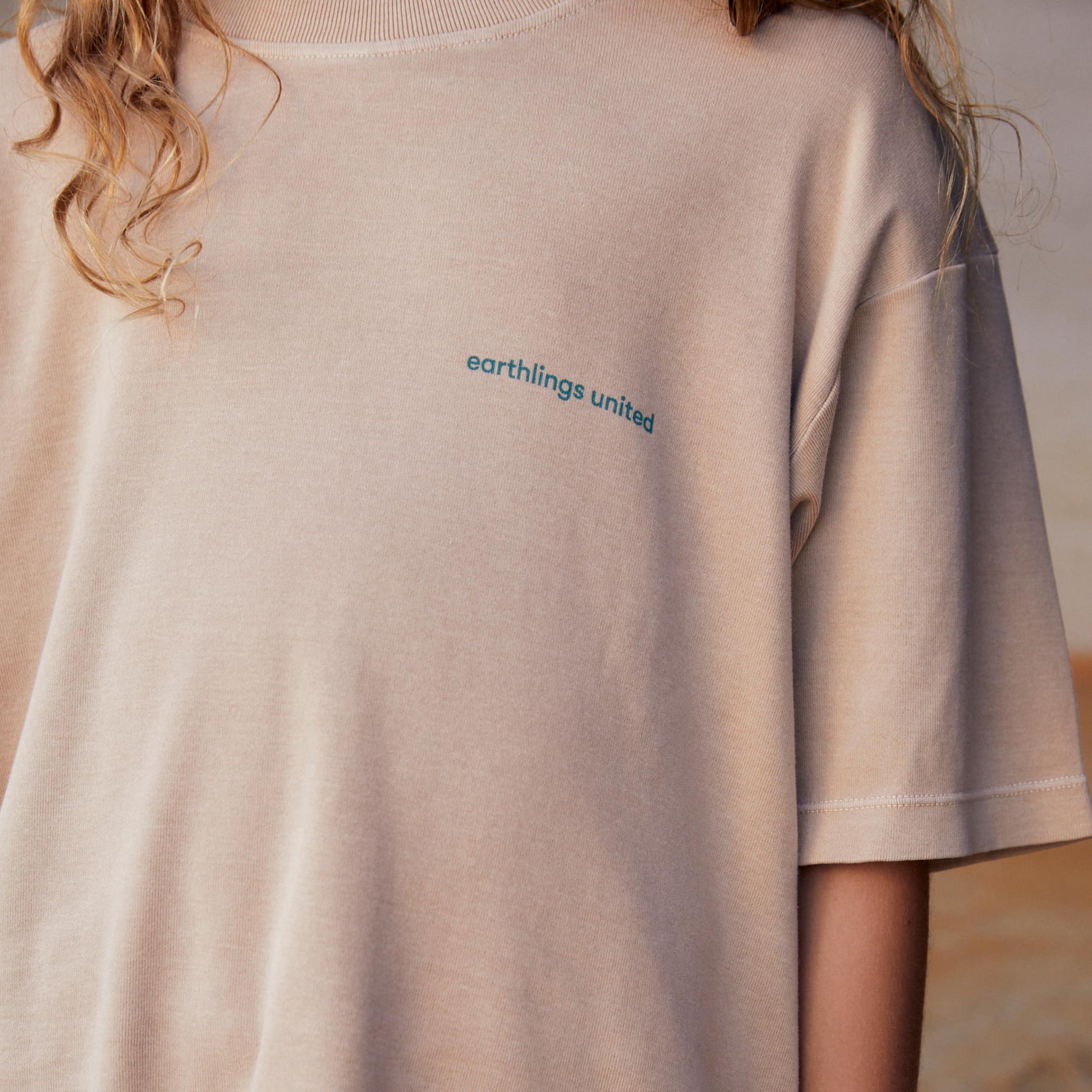 Sustainable cream kids' T-shirt by Earthlings United, made from soft organic cotton for long-lasting wear